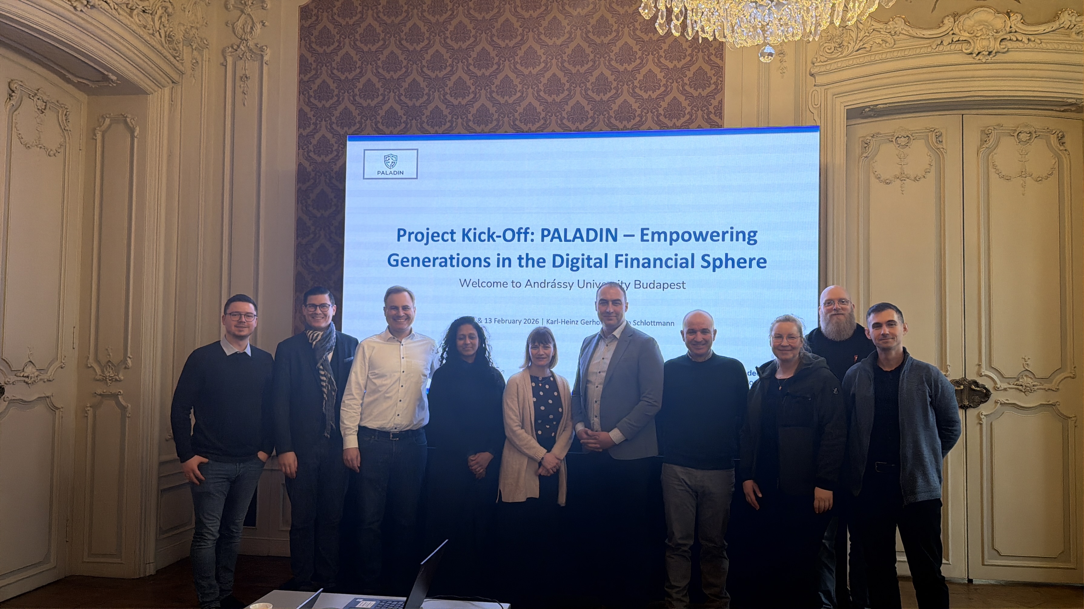The PALADIN consortium gathered in front of the project presentation at Andrassy University Budapest